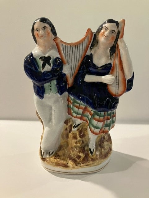 Antique Staffordshire Statue of a Couple Playing Musical Instruments